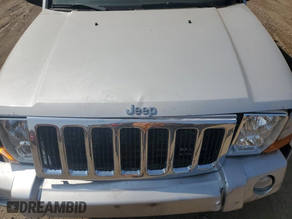 2007 Jeep Commander Limited with VIN 1J8HG58P87C595890, listed as a Copart auction lot 71123654 with 148,438 mi miles and Salvage Title. Bid and sale history available at carsss.com. Image 13.