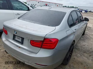 2014 BMW 3 Series 328i with VIN WBA3A5G52ENP31318, listed as a IAAI auction lot 42801411 with 149,355 mi miles and . Bid and sale history available at DreamBid. Image 4.