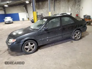 2001 Mazda Protege LX with VIN JM1BJ225710490366, listed as a Copart auction lot 44670235 with 217,746 mi miles and Salvage Title. Bid and sale history available at carsss.com. Image 1.