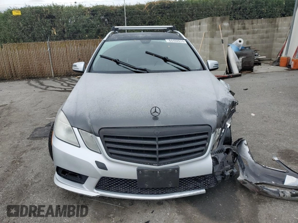 2011 Mercedes-Benz E 350 Luxury with VIN WDDHH8HB8BA351807, listed as a Copart auction lot 84492674 with 122,509 mi miles and Salvage Title. Bid and sale history available at DreamBid. Image 5.
