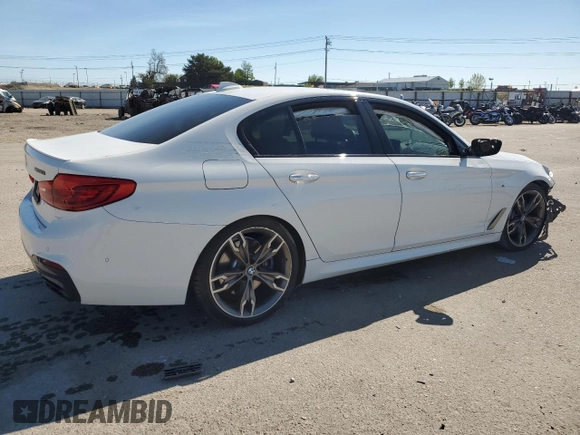 2018 BMW 5 Series M550i xDrive with VIN WBAJB9C51JB287233, listed as a Copart auction lot 55899505 with Not provided miles and Salvage title. Bid and sale history available at DreamBid. Image 3.