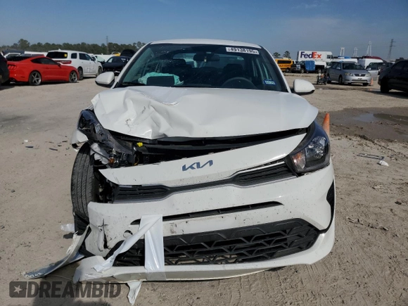 2023 Kia Rio S z VIN 3KPA24AD1PE597734, wystawiony jako Copart lot #49138195 z przebiegiem 11 796 mil mil oraz Szkoda całkowita • Salvage title. Historia ofert i sprzedaży dostępna na DreamBid. Obrazek 5.