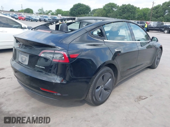 2018 Tesla Model 3 Long Range Battery z VIN 5YJ3E1EB3JF178812, wystawiony jako IAAI lot #42124838 z przebiegiem 124 229 mil mil oraz . Historia ofert i sprzedaży dostępna na DreamBid. Obrazek 4.