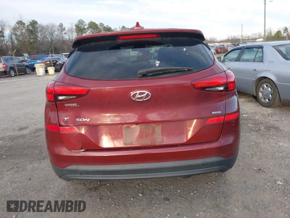 2019 Hyundai Tucson SE with VIN KM8J2CA49KU881841, listed as a IAAI auction lot 41099575 with 129,153 mi miles. Bid and sale history available at carsss.com. Image 16.