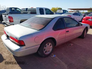 1995 Ford Thunderbird LX with VIN 1FALP62W8SH127506, listed as a IAAI auction lot 41808971 with 139,284 mi miles. Bid and sale history available at carsss.com. Image 4.