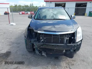 2013 Cadillac SRX Performance Collection z VIN 3GYFNDE39DS543037, wystawiony jako IAAI lot #42162276 z przebiegiem 156 282 mil mil oraz . Historia ofert i sprzedaży dostępna na DreamBid. Obrazek 12.