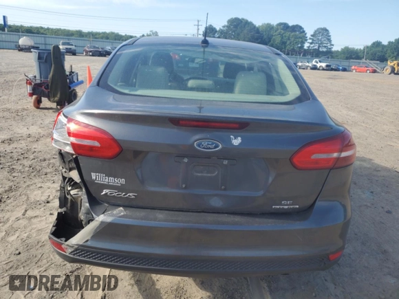 2015 Ford Focus SE with VIN 1FADP3F22FL344062, listed as a Copart auction lot 58136595 with 146,675 mi miles and Clean title. Bid and sale history available at DreamBid. Image 6.