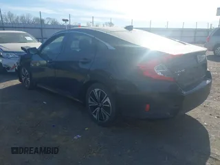 2016 Honda Civic EX-T z VIN 2HGFC1F3XGH630558, wystawiony jako IAAI lot #41868334 z przebiegiem 154 452 mil mil oraz . Historia ofert i sprzedaży dostępna na DreamBid. Obrazek 3.
