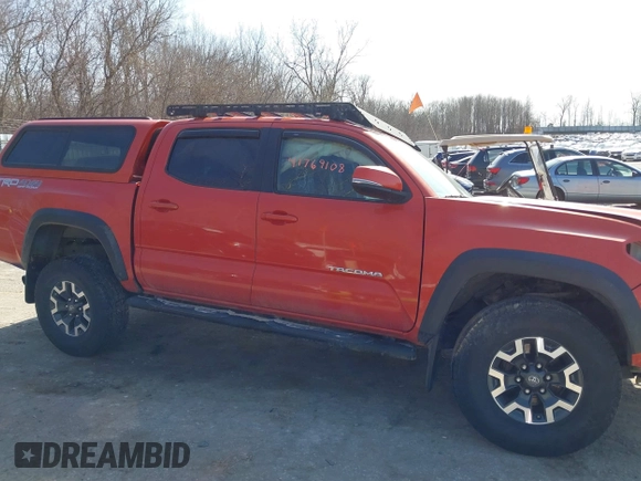 2016 Toyota Tacoma SR with VIN 3TMCZ5AN0GM001120, listed as a IAAI auction lot 41769108 with 190,635 mi miles and . Bid and sale history available at DreamBid. Image 13.