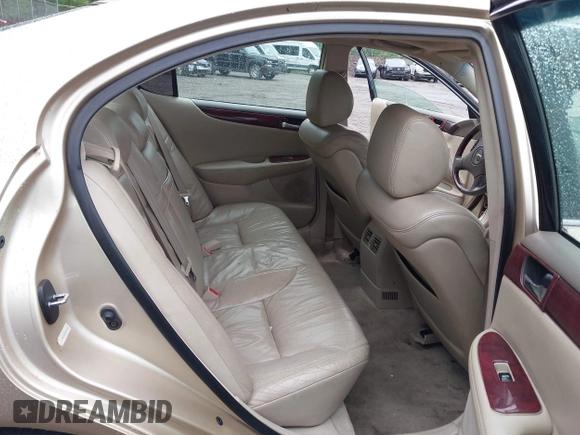 2002 Lexus ES 300 z VIN JTHBF30G720057657, wystawiony jako IAAI lot #42532340 z przebiegiem 247 680 mil mil oraz . Historia ofert i sprzedaży dostępna na DreamBid. Obrazek 8.