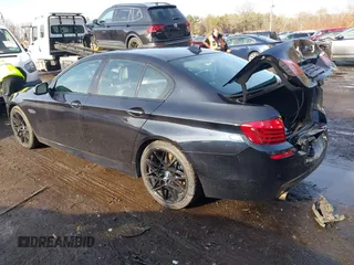 2015 BMW 5 Series 535i xDrive with VIN WBA5B3C56FD540699, listed as a IAAI auction lot 41128002 with 97,726 mi miles and . Bid and sale history available at DreamBid. Image 3.