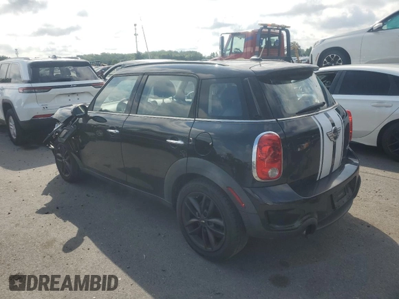 2012 MINI Countryman S with VIN WMWZC3C50CWM28043, listed as a Copart auction lot 64701505 with 166,819 mi miles and Salvage title. Bid and sale history available at DreamBid. Image 2.