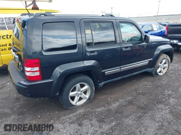 2011 Jeep Liberty Limited 70th Anniversary with VIN 1J4PN5GK0BW572037, listed as a IAAI auction lot 42187728 with 90,706 mi miles and . Bid and sale history available at DreamBid. Image 4.