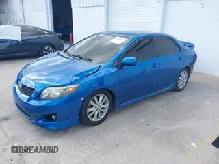 2009 Toyota Corolla with VIN 2T1BU40E69C154781, listed as a IAAI auction lot 42009936 with 180,039 mi miles. Bid and sale history available at carsss.com. Image 2.