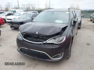 2017 Chrysler Pacifica Touring L with VIN 2C4RC1BG1HR797200, listed as a IAAI auction lot 42044020 with 124,115 mi miles and . Bid and sale history available at DreamBid. Image 6.