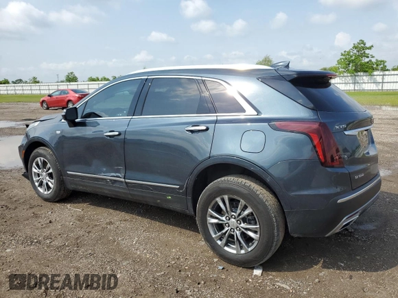2021 Cadillac XT5 FWD Premium Luxury with VIN 1GYKNCRSXMZ118083, listed as a Copart auction lot 54703225 with 45,973 mi miles and Salvage Title. Bid and sale history available at carsss.com. Image 2.