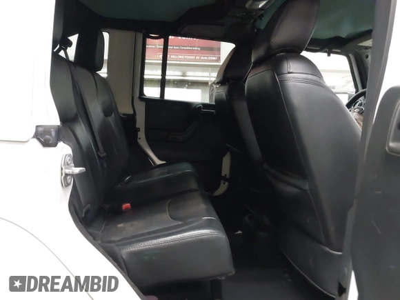 2017 Jeep Wrangler Unlimited Sahara with VIN 1C4BJWEG2HL700840, listed as a IAAI auction lot 42631036 with 60,610 mi miles and . Bid and sale history available at DreamBid. Image 8.