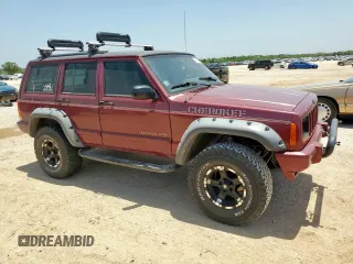 1999 Jeep Cherokee Sport с VIN 1J4FT68S5XL675839, выставлен на аукционе Copart как лот 65230005 с пробегом 204 102 миль миль и Списание • Salvage title. История ставок и продаж доступна на DreamBid. Изображение 4.