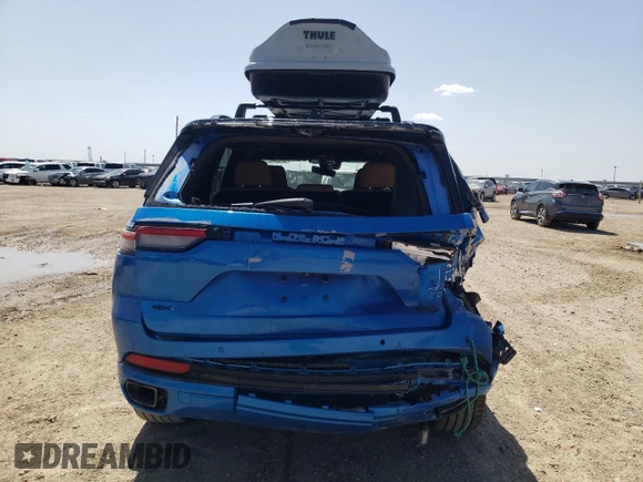 2023 Jeep Grand Cherokee Summit Reserve with VIN 1C4RJYE60P8881133, listed as a Copart auction lot 52354915 with 31,739 mi miles and Salvage title. Bid and sale history available at DreamBid. Image 6.