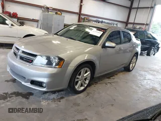 2014 Dodge Avenger SXT z VIN 1C3CDZCBXEN234910, wystawiony jako IAAI lot #42399464 z przebiegiem 152 026 mil mil oraz . Historia ofert i sprzedaży dostępna na DreamBid. Obrazek 2.