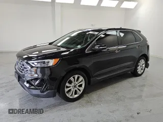 2020 Ford Edge Titanium z VIN 2FMPK4K93LBA00455, wystawiony jako Copart lot #56677705 z przebiegiem 109 992 mil mil oraz Czysty tytuł • Clean title. Historia ofert i sprzedaży dostępna na DreamBid. Obrazek 1.