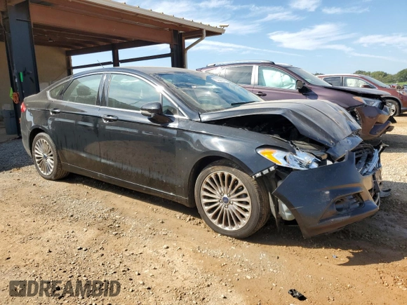 2016 Ford Fusion Titanium z VIN 3FA6P0K98GR151640, wystawiony jako Copart lot #73254594 z przebiegiem 145 473 mil mil oraz Szkoda całkowita • Salvage title. Historia ofert i sprzedaży dostępna na DreamBid. Obrazek 4.