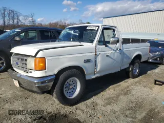 1987 Ford F-150 with VIN 1FTCF15Y7HNA56371, listed as a Copart auction lot 85441274 with 76,200 mi miles and Salvage Title. Bid and sale history available at carsss.com. Image 1.