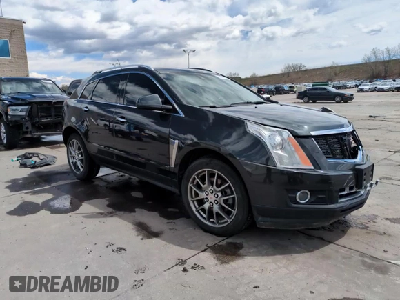 2014 Cadillac SRX Premium Collection z VIN 3GYFNGE34ES676646, wystawiony jako Copart lot #53478695 z przebiegiem 115 096 mil mil oraz Szkoda całkowita • Salvage title. Historia ofert i sprzedaży dostępna na DreamBid. Obrazek 14.