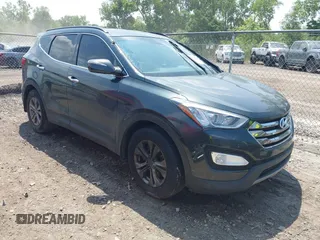2014 Hyundai Santa Fe with VIN 5XYZU3LB9EG134551, listed as a IAAI auction lot 42597220 with 140,993 mi miles and . Bid and sale history available at DreamBid. Image 1.