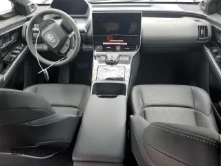 2024 Toyota bZ4X XLE with VIN JTMAAAAA8RA045760, listed as a Copart auction lot 50996385 with 3,833 mi miles and Salvage Title. Bid and sale history available at DreamBid. Image 8.