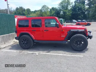 2021 Jeep Wrangler Unlimited Sahara z VIN 1C4HJXEGXMW631033, wystawiony jako IAAI lot #42550070 z przebiegiem 54 429 mil mil oraz . Historia ofert i sprzedaży dostępna na DreamBid. Obrazek 13.
