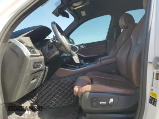 2020 BMW X5 xDrive40i with VIN 5UXCR6C09L9C13127, listed as a Copart auction lot 53941035 with 76,685 mi miles and Salvage title. Bid and sale history available at DreamBid. Image 7.