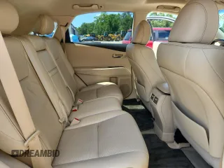 2015 Lexus RX 350 z VIN 2T2ZK1BA0FC207396, wystawiony jako Copart lot #65458815 z przebiegiem 74 443 mil mil oraz Szkoda całkowita • Salvage title. Historia ofert i sprzedaży dostępna na DreamBid. Obrazek 11.