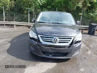 2012 Volkswagen Routan SE with VIN 2C4RVABG3CR293458, listed as a IAAI auction lot 42210411 with 139,390 mi miles and . Bid and sale history available at DreamBid. Image 6.