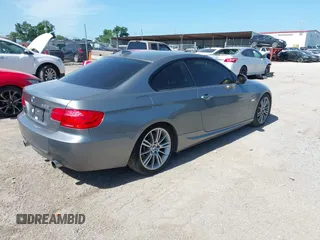 2012 BMW 3 Series 335i with VIN WBAKG7C53CE802941, listed as a IAAI auction lot 42574469 with 125,908 mi miles and . Bid and sale history available at DreamBid. Image 4.