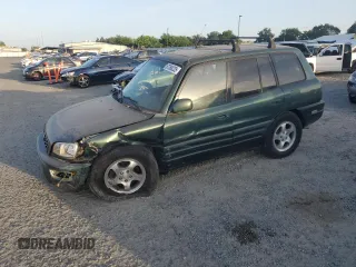 1999 Toyota RAV4 with VIN JT3GP10V5X7058381, listed as a Copart auction lot 57288235 with 264,986 mi miles and Salvage title. Bid and sale history available at DreamBid. Image 1.