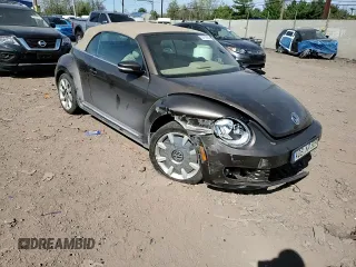 2014 Volkswagen Beetle 2.0L TDI с VIN 3VW6L7ATXEM809087, выставлен на аукционе Copart как лот 53710365 с пробегом Не указан миль и Списание • Salvage title. История ставок и продаж доступна на DreamBid. Изображение 14.