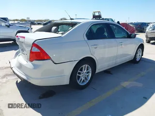 2012 Ford Fusion S with VIN 3FAHP0GA0CR137074, listed as a IAAI auction lot 41756162 with 165,205 mi miles. Bid and sale history available at carsss.com. Image 4.