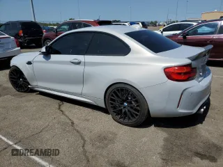 2019 BMW M2 Competition with VIN WBS2U7C55KVJ07752, listed as a Copart auction lot 68128844 with 67,363 mi miles and Salvage Title. Bid and sale history available at carsss.com. Image 2.