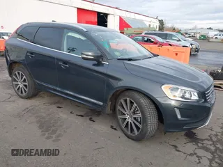 2015 Volvo XC60 T5 z VIN YV4612RK4F2633344, wystawiony jako IAAI lot #41504235 z przebiegiem 97 398 mil mil oraz . Historia ofert i sprzedaży dostępna na DreamBid. Obrazek 1.