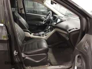 2013 Ford Escape SEL with VIN 1FMCU9H99DUD11347, listed as a IAAI auction lot 41758824 with 154,339 mi miles. Bid and sale history available at carsss.com. Image 5.