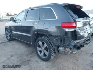2014 Jeep Grand Cherokee Overland with VIN 1C4RJFCT8EC380899, listed as a IAAI auction lot 41372034 with 140,413 mi miles. Bid and sale history available at carsss.com. Image 3.