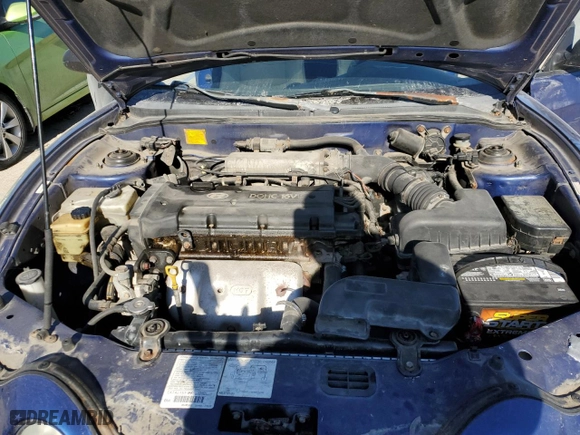 2001 Hyundai Tiburon with VIN KMHJG25F11U261457, listed as a Copart auction lot 43012635 with 165,625 mi miles and Salvage Title. Bid and sale history available at carsss.com. Image 11.
