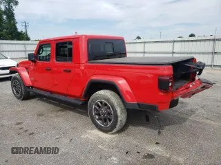 2021 Jeep Gladiator High Altitude z VIN 1C6HJTFG4ML579074, wystawiony jako Copart lot #57145415 z przebiegiem 52 145 mil mil oraz Szkoda całkowita • Salvage title. Historia ofert i sprzedaży dostępna na DreamBid. Obrazek 2.