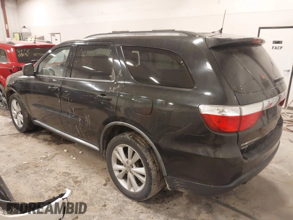 2012 Dodge Durango Crew with VIN 1C4SDJDT6CC205946, listed as a IAAI auction lot 41531175 with 211,372 mi miles and . Bid and sale history available at carsss.com. Image 3.