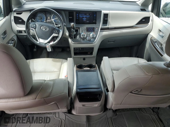 2016 Toyota Sienna XLE with VIN 5TDYK3DC8GS715148, listed as a Copart auction lot 57834045 with 128,769 mi miles and Salvage title. Bid and sale history available at DreamBid. Image 8.