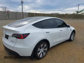 2021 Tesla Model Y Long Range with VIN 5YJYGDEE6MF122363, listed as a IAAI auction lot 41952018 with 54,263 mi miles and . Bid and sale history available at carsss.com. Image 4.