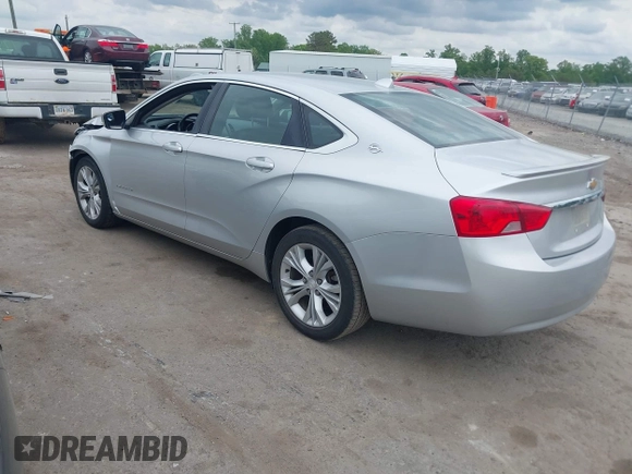 2014 Chevrolet Impala LT with VIN 2G1125S3XE9114130, listed as a IAAI auction lot 42128077 with 209,391 mi miles and . Bid and sale history available at DreamBid. Image 3.