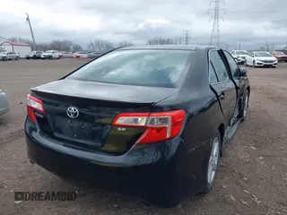 2012 Toyota Camry L with VIN 4T1BF1FK4CU094074, listed as a IAAI auction lot 41923263 with 105,780 mi miles and . Bid and sale history available at carsss.com. Image 4.