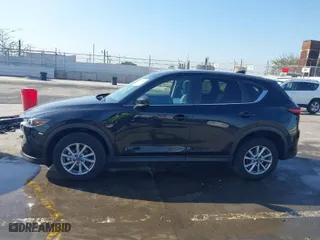 2023 Mazda CX-5 2.5 S Select Package with VIN JM3KFBBM9P0271823, listed as a IAAI auction lot 41858258 with 17,498 mi miles. Bid and sale history available at carsss.com. Image 14.